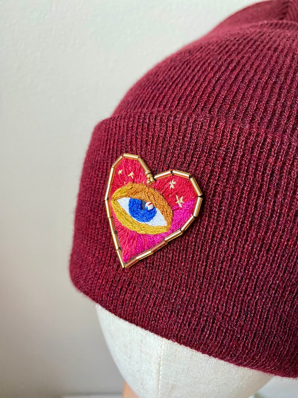 Red Beanie with Handmade Embroidery – Heart Eye