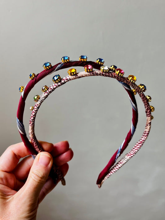 Silk Tie Headband in Burgundy alongside another headband, showing two styles