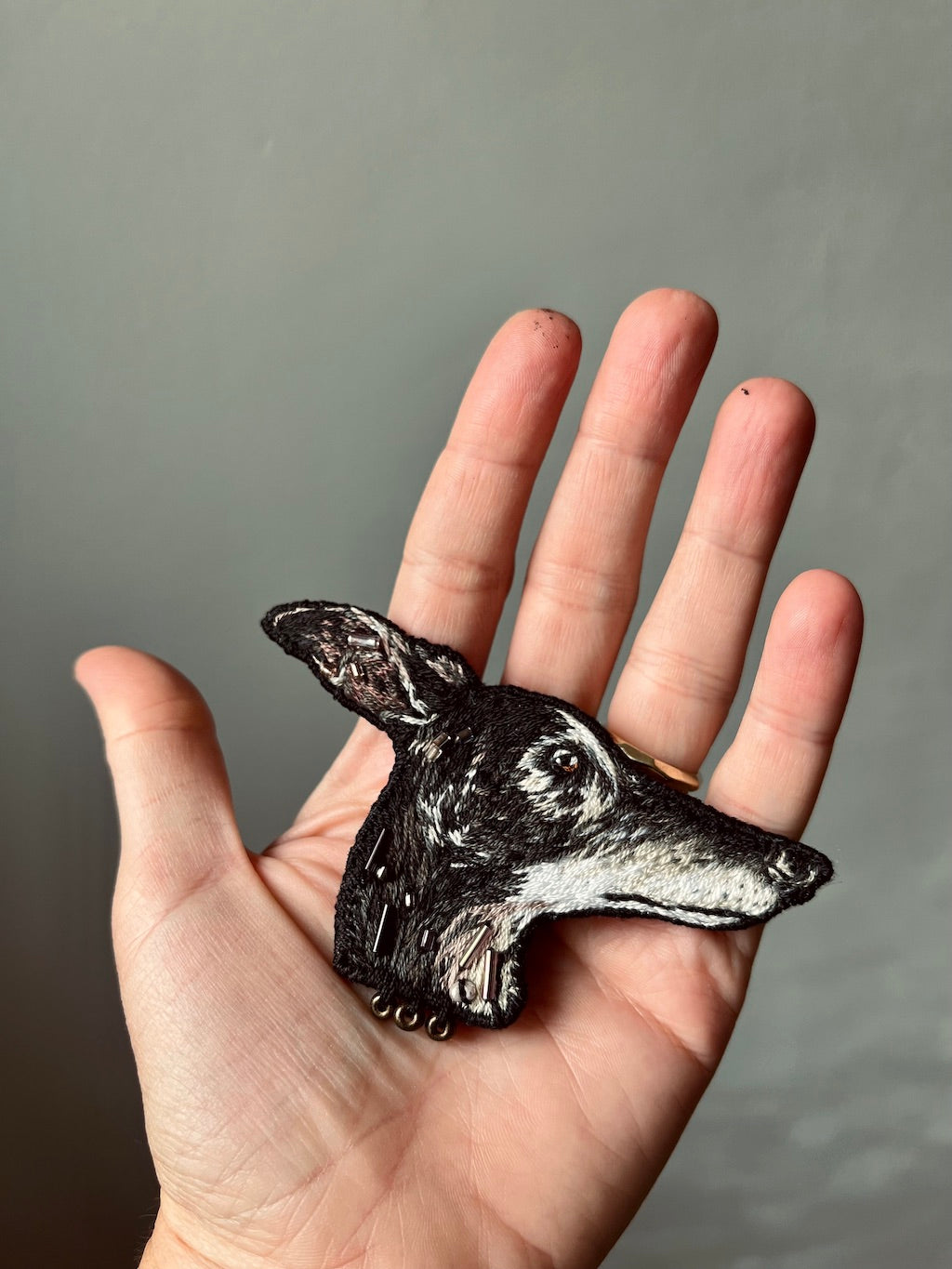 Hand-embroidered Black Greyhound (Galgo) Brooch. Solo artisan-made with a focus on ethical, slow fashion and lasting detail.