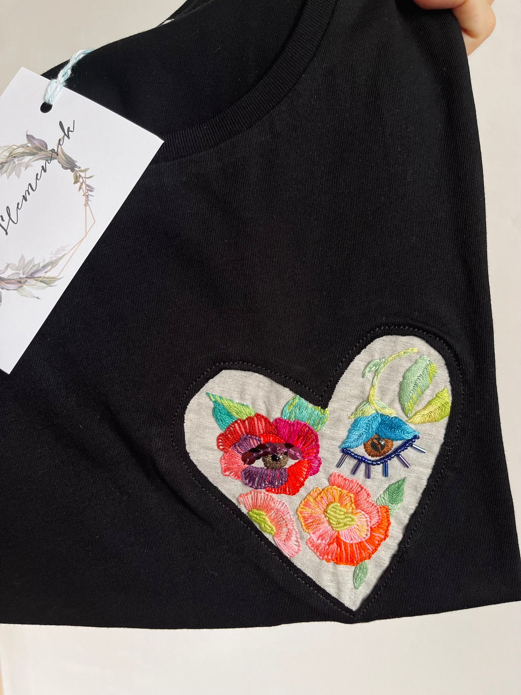Hand-Embroidered T-Shirt — Garden Heart Flower Eyes (Black, L)