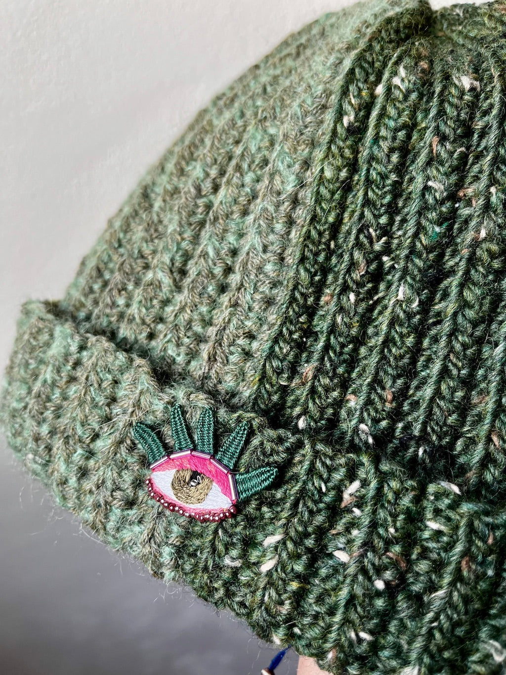 Handmade Crochet Beanie – Eye Embroidery (Green) with Upcycled Yarn