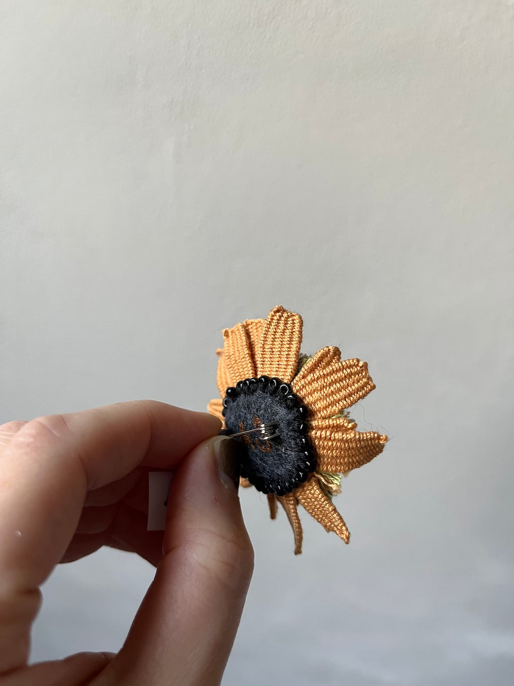 Handmade Embroidered Brooch – Flower Eye in Orange with Grey Beads