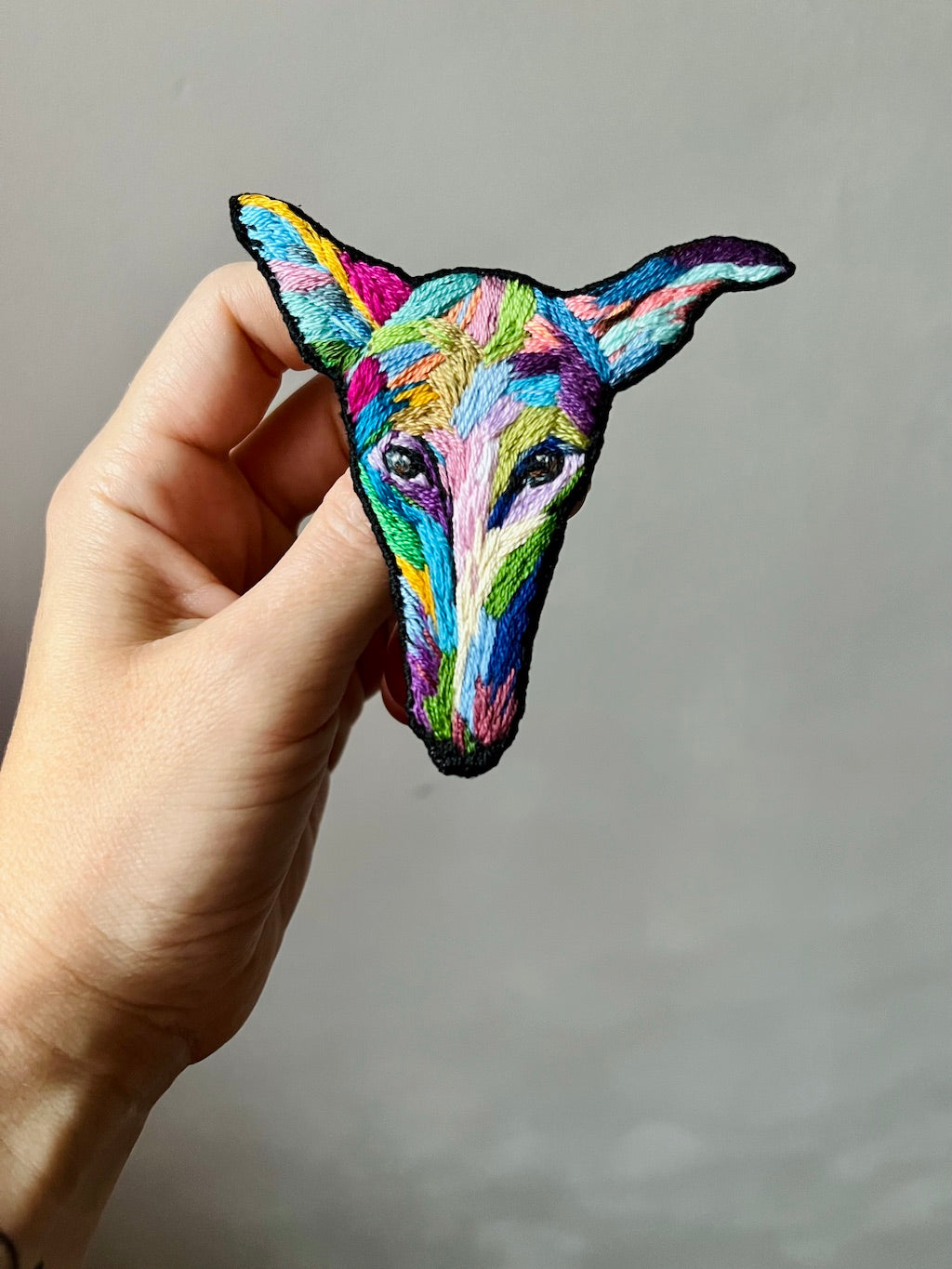 Hand-embroidered rainbow greyhound memorial brooch, handmade in Vienna, Austria