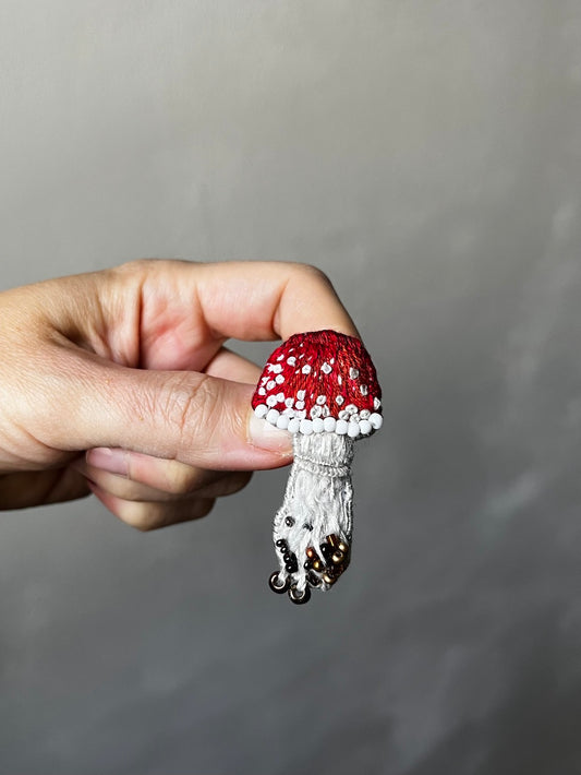 Hand-embroidered fly agaric mushroom brooch with glass beads, handmade in Vienna